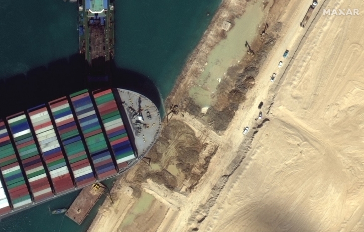 Ship ‘partially refloated,’ but still stuck in Suez Canal