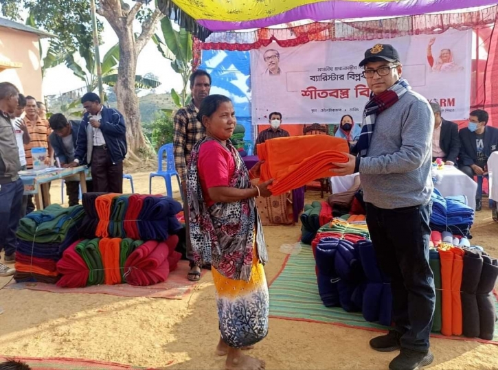 KSRM distributes winter clothes among poor people in Moulvibazar