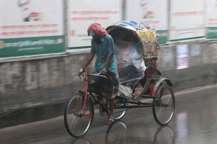 Splash of winter rain shivers city dwellers