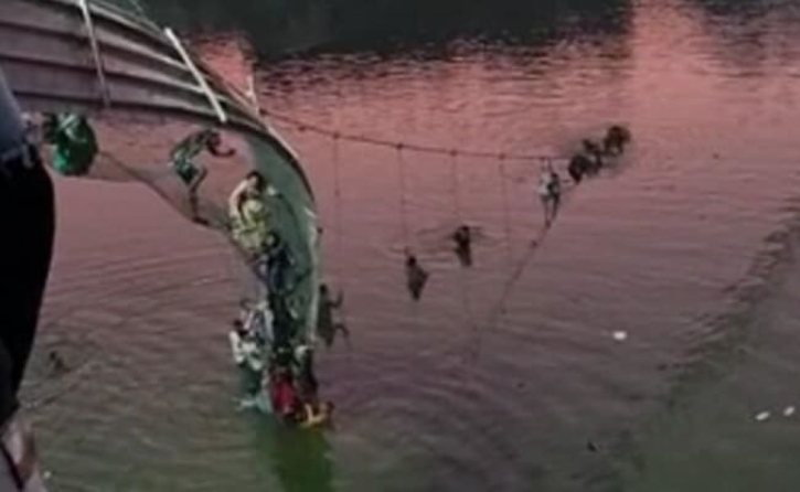 Hundreds plunge into river after India bridge collapses