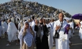 Muslim pilgrims pray on Mount Arafat in hajj climax