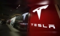 Tesla reports profit drop on price cuts, lower vehicle sales