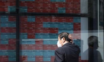 Asian markets track Wall St records after Powell hints at rate cut