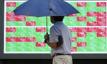 Asian markets boosted by Fed chief’s rate cut talk